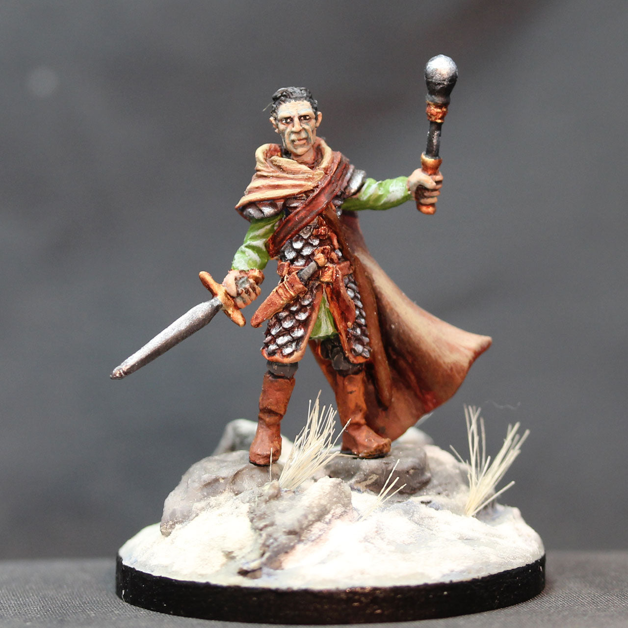 Armored magic user with sword and mace