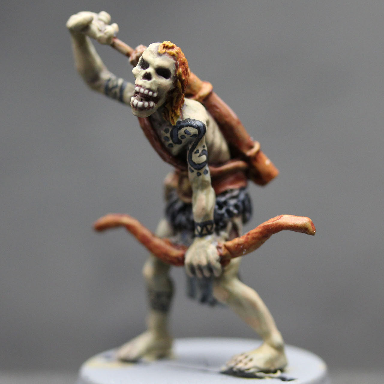 Undead barbarian with bow drawing arrow