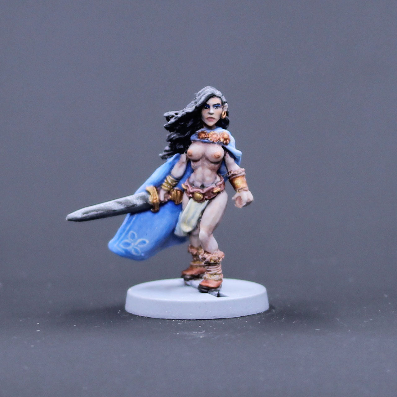 Barbarian female walking with sword