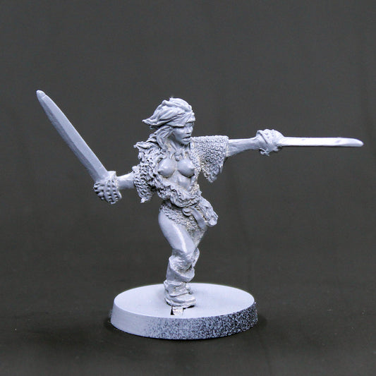 Khristine Female barbarian with two swords attacking