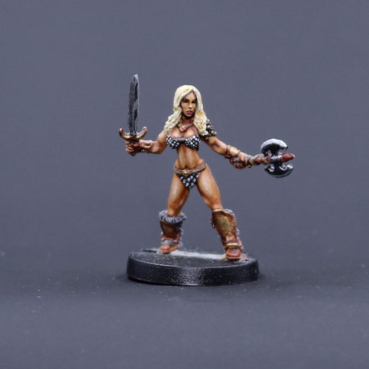 Barbarian female with sword and axe