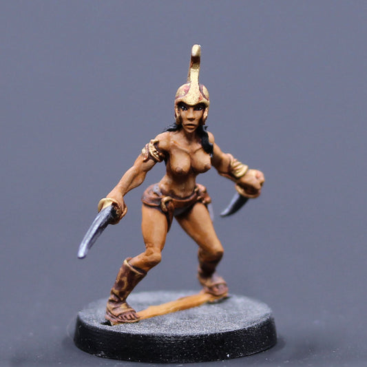 Female Red Man ready with sword and dagger