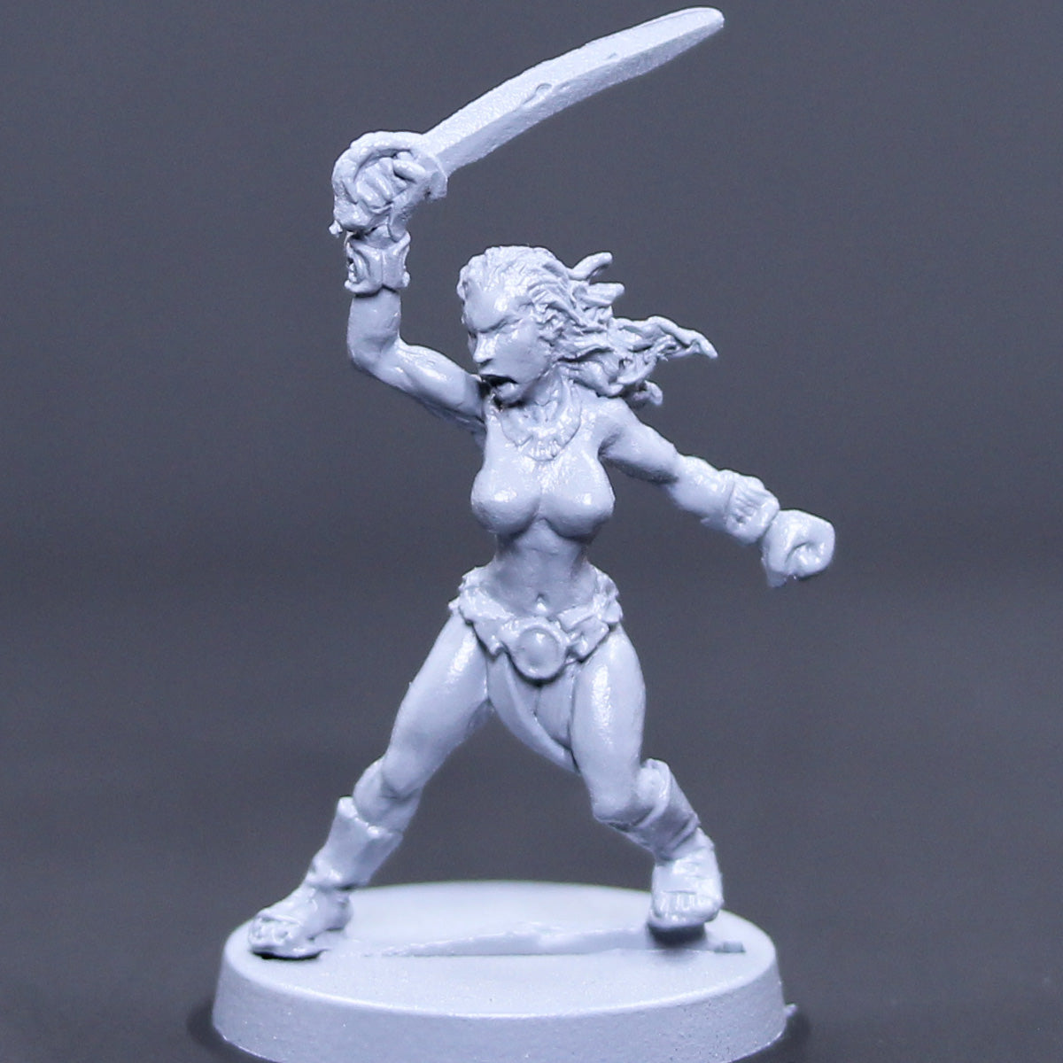 Female Red Man attacking with sword