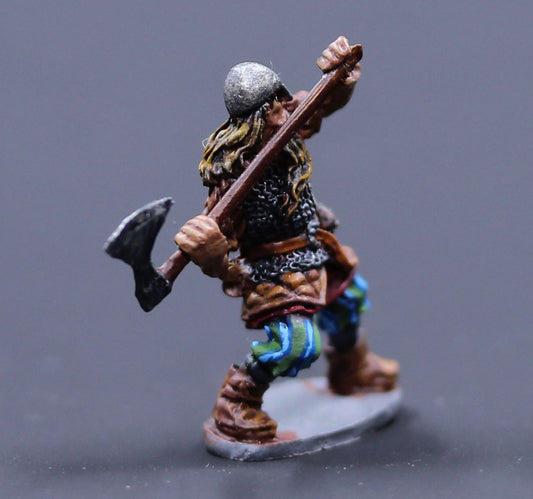 Viking Male chainmail with great axe drawn back to swing