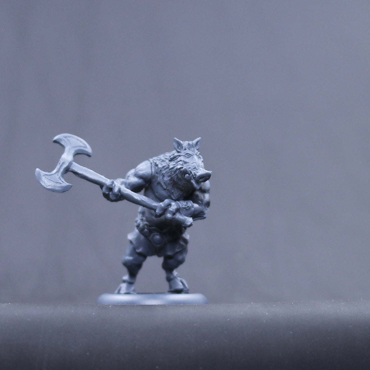 Circie children/ Pig ogre with two handed axe.