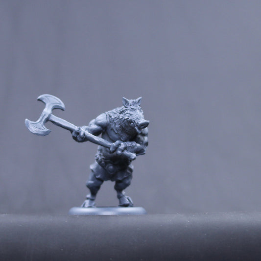 Circie children/ Pig ogre with two handed axe.