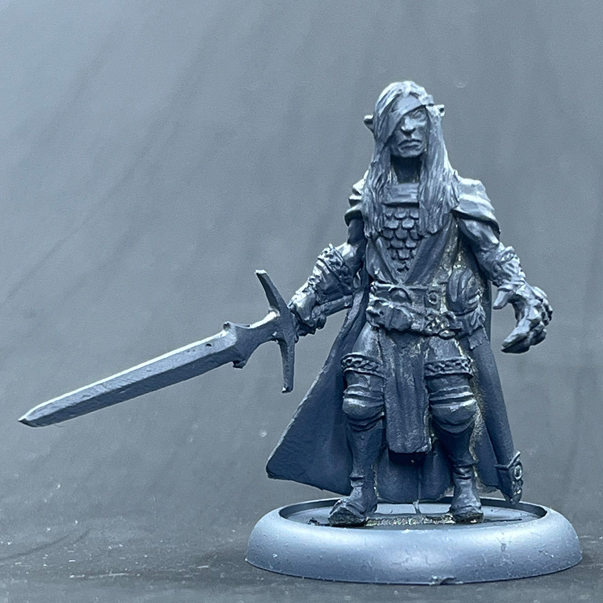 Grey Elf Lord wounded with Demon gauntlet